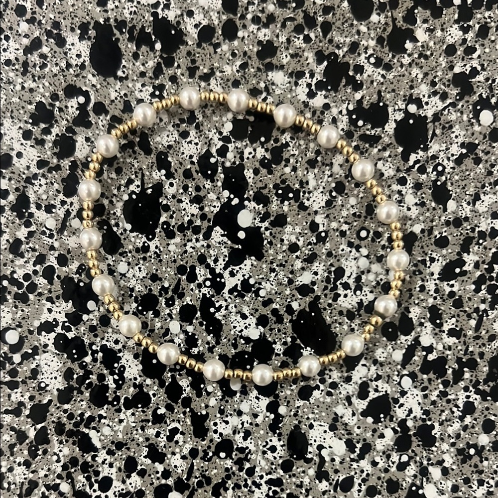 Elegant Enewton Gold and White Pearl Bracelet